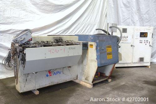 Used APV MP 2000 Series 50mm Twin Screw Extruder, MP 2050. Approximately 25:1 L/D ratio. Co-rotating side by side intermeshing screw design. Top vented electrically heated, water cooled split design ...