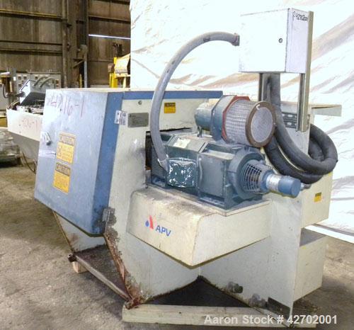 Used APV MP 2000 Series 50mm Twin Screw Extruder, MP 2050. Approximately 25:1 L/D ratio. Co-rotating side by side intermeshing screw design. Top vented electrically heated, water cooled split design ...