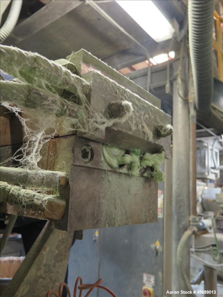 Used APV Baker Perkins 80mm Twin Screw Extruder, Model MP 2080.  DC Motor 150HP.  New PIV gearbox.  Includes; Schenck Accurate 902M Series Feeder, Steel Belt Systems Cooling Belt, Controls and Drive ...