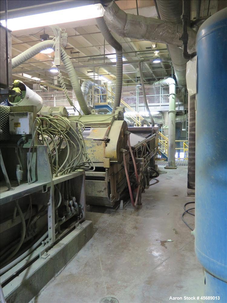 Used APV Baker Perkins 80mm Twin Screw Extruder, Model MP 2080.  DC Motor 150HP.  New PIV gearbox.  Includes; Schenck Accurate 902M Series Feeder, Steel Belt Systems Cooling Belt, Controls and Drive ...