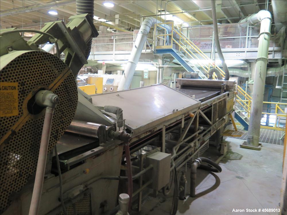 Used APV Baker Perkins 80mm Twin Screw Extruder, Model MP 2080.  DC Motor 150HP.  New PIV gearbox.  Includes; Schenck Accurate 902M Series Feeder, Steel Belt Systems Cooling Belt, Controls and Drive ...