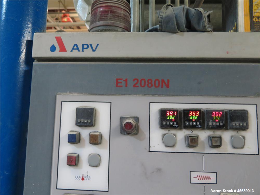 Used APV Baker Perkins 80mm Twin Screw Extruder, Model MP 2080.  DC Motor 150HP.  New PIV gearbox.  Includes; Schenck Accurate 902M Series Feeder, Steel Belt Systems Cooling Belt, Controls and Drive ...