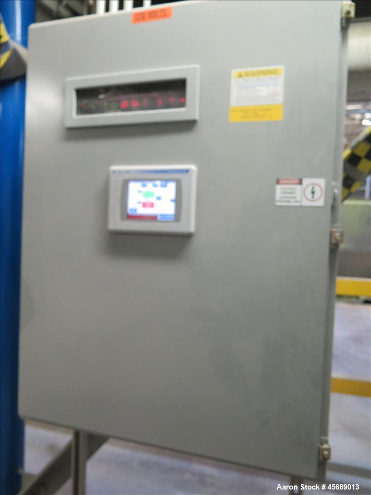 Used APV Baker Perkins 80mm Twin Screw Extruder, Model MP 2080.  DC Motor 150HP.  New PIV gearbox.  Includes; Schenck Accurate 902M Series Feeder, Steel Belt Systems Cooling Belt, Controls and Drive ...