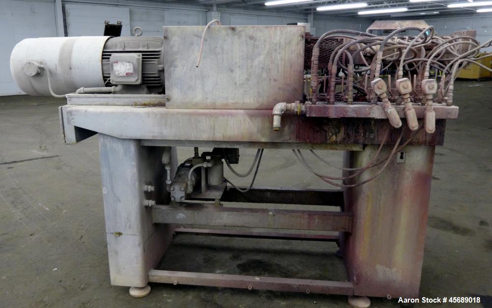 Used APV Baker Perkins 30mm Twin Screw Compounder Extruder, Model MP30. Approximate 15 to 1 L/D ratio. Co-rotating screw design. Clamshell design, 3 zone electrically heated, liquid cooled barrel. Wa...