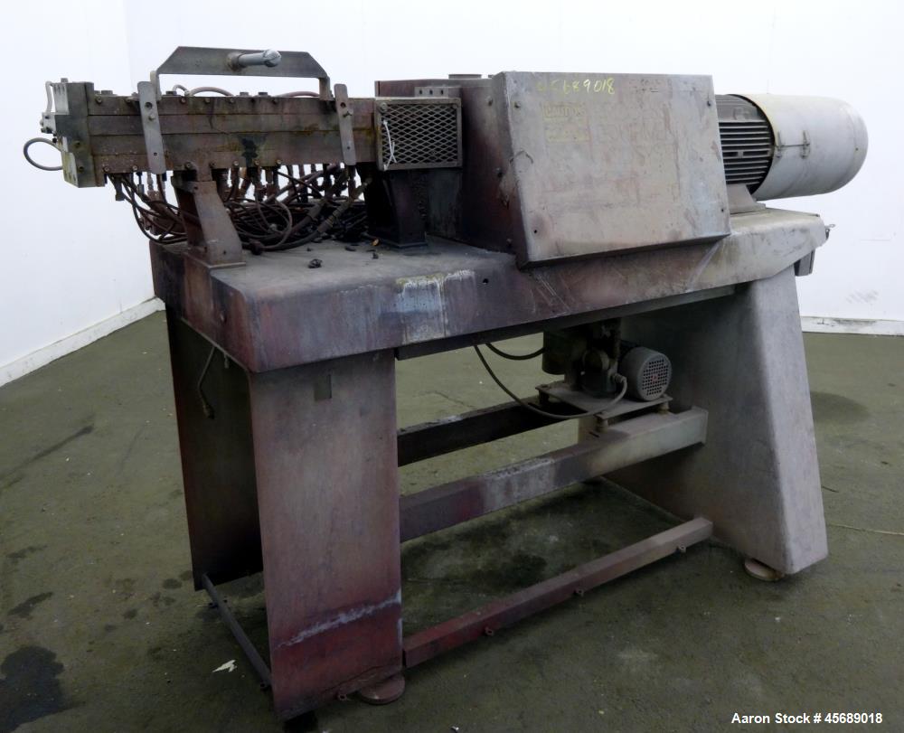 Used APV Baker Perkins 30mm Twin Screw Compounder Extruder, Model MP30. Approximate 15 to 1 L/D ratio. Co-rotating screw design. Clamshell design, 3 zone electrically heated, liquid cooled barrel. Wa...