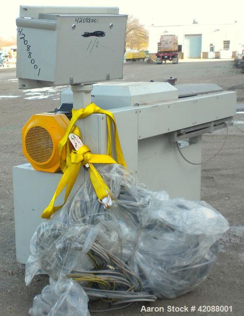 Used APV Twin Screw Extruder, 50mm screw diameter. Approximately 15 to 1 L/D ratio. Co-rotating screw design. Vented, electrically heated, water cooled barrel. (1) Feed section. Driven by an 18.5 kw ...
