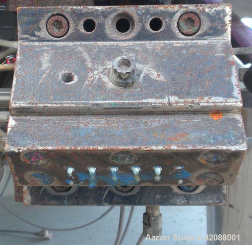 Used APV Twin Screw Extruder, 50mm screw diameter. Approximately 15 to 1 L/D ratio. Co-rotating screw design. Vented, electrically heated, water cooled barrel. (1) Feed section. Driven by an 18.5 kw ...