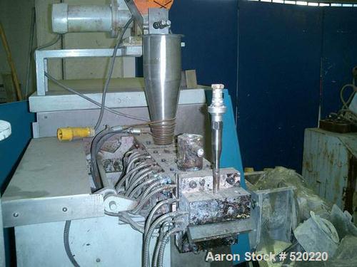 USED: APV lab size twin screw extruder, 30mm, 15:1 L/D. 1.17" diameterx 17.6" long (30mm diameter x 450mm long) screws. Screw speed 0-500 rpm via a gearbox by an 11.25 hp/7.5 kw main motor. Split bar...