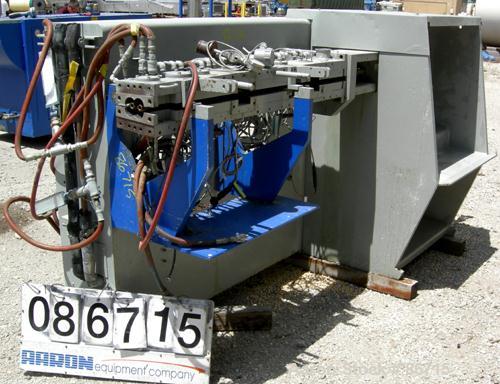 Used Baker Perkins Twin Screw Extruder, 50 MM Screw Diameter, Model MP2050. Approximate 25:1 L/D ratio. Co-rotating screw design. Clamshell design, 5 zone electrically heated, water cooled barrel sec...