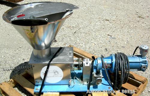 Used Baker Perkins Twin Screw Extruder, 50 MM Screw Diameter, Model MP2050. Approximate 25:1 L/D ratio. Co-rotating screw design. Clamshell design, 5 zone electrically heated, water cooled barrel sec...
