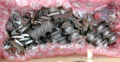 Used Baker Perkins Twin Screw Extruder, 50 MM Screw Diameter, Model MP2050. Approximate 25:1 L/D ratio. Co-rotating screw design. Clamshell design, 5 zone electrically heated, water cooled barrel sec...