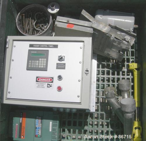 Used Baker Perkins Twin Screw Extruder, 50 MM Screw Diameter, Model MP2050. Approximate 25:1 L/D ratio. Co-rotating screw design. Clamshell design, 5 zone electrically heated, water cooled barrel sec...
