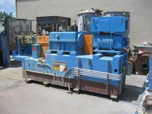 Used-Baker Perkins 100 mm twin screw compounding extruder. Segmented twin screws. 50 hp DC Siemens Allis main drive motor. B...