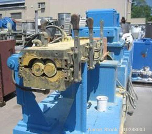 Used-Baker Perkins 100 mm twin screw compounding extruder. Segmented twin screws. 50 hp DC Siemens Allis main drive motor. B...