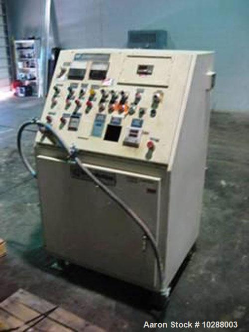 Used-Baker Perkins 100 mm twin screw compounding extruder. Segmented twin screws. 50 hp DC Siemens Allis main drive motor. B...