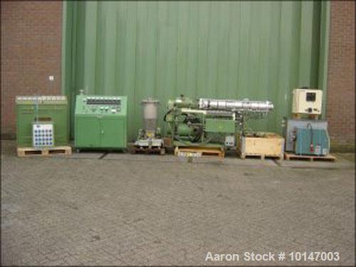Used Berstorff double screw extruder, model ZE-40 A x 38D, serial No. 90-2-EO. 5486/84, new 1985, screw diameter 40mm (1.6"), L/D 38, vented, number of heating zones: 8, electric heating, water cooli...