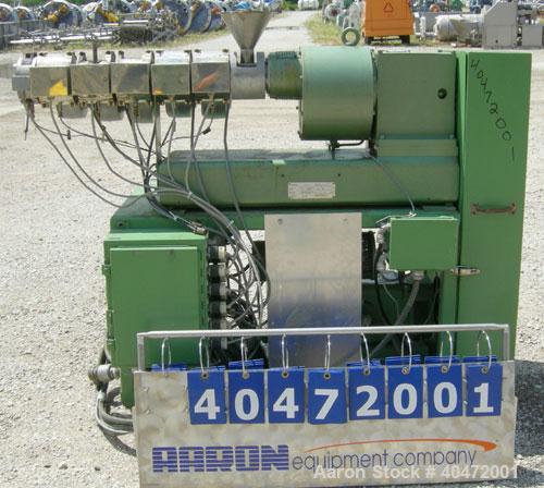 Used Berstorff 25mm Twin Screw Extruder, model ZE25. Co-rotating side by side screw design. Approximately 28 to 1 L/D ratio. 5 barrel sections, electrically heated, air cooled, 1 feed section. 46" ce...