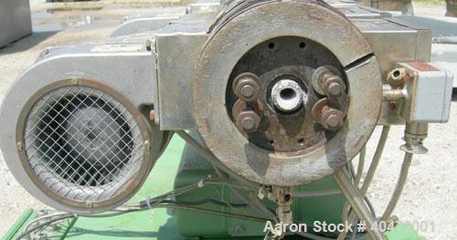 Used Berstorff 25mm Twin Screw Extruder, model ZE25. Co-rotating side by side screw design. Approximately 28 to 1 L/D ratio. 5 barrel sections, electrically heated, air cooled, 1 feed section. 46" ce...