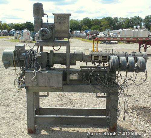 Used Berstorff 25mm Twin Screw Extruder, type ZE25, co-rotating intermeshing side by side screw design. Approximate 33 to 1 L/D ratio. 6 barrel sections, 1 feed section with a top mounted K-Tron type...