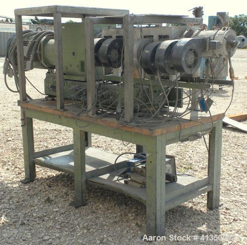Used Berstorff 25mm Twin Screw Extruder, type ZE25, co-rotating intermeshing side by side screw design. Approximate 38 to 1 L/D ratio. 7 barrel sections, 1 feed section, (1) 2 hole strand die. Electr...