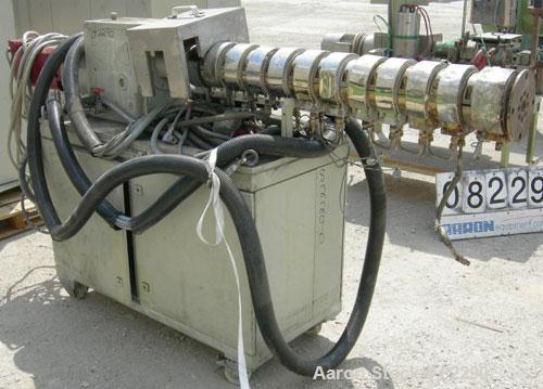 Used Berstorff Lab Size Twin Screw Extruder, Type ZE25. 25 mm screws. 33:1 L/D. Side by side, co-rotating, 11 barrel sections, electrically heated. Max screw speed 550 rpm by a 9/10/11 kW, 3 ph/52/60...