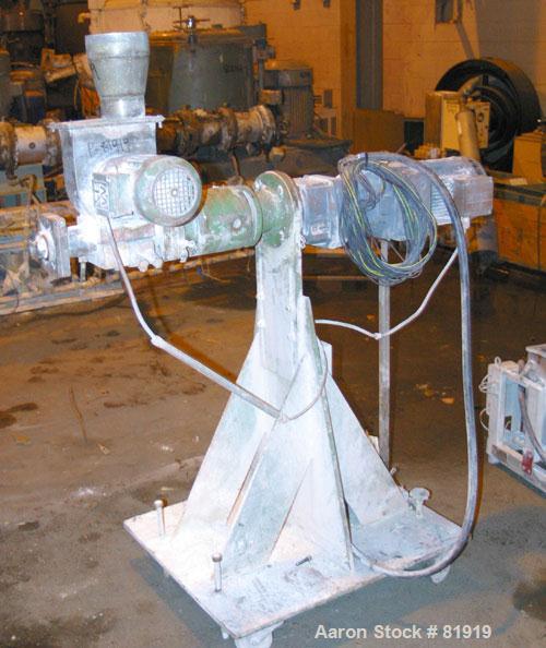 Used Berstorff Twin Screw Extrusion System consisting of: (1) Berstorff 60 mm twin screw extruder, model ZE60A35, approximate 30:1 L/D ratio, side by side co-rotating screws, (7) barrel zones, electr...