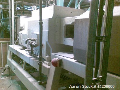 Used Compex PVC Compounding Line, type MPC 85/2, for up to 454 lbs (1000 kg) per hour PVC, 85 mm (3 1/3") diameter twin screws. Complete with gearbox and motor. Includes (1) hot die face cutting, (1)...
