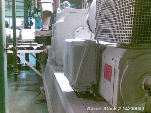 Used Compex PVC Compounding Line, type MPC 85/2, for up to 454 lbs (1000 kg) per hour PVC, 85 mm (3 1/3") diameter twin screws. Complete with gearbox and motor. Includes (1) hot die face cutting, (1)...