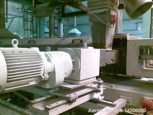Used Compex PVC Compounding Line, type MPC 85/2, for up to 454 lbs (1000 kg) per hour PVC, 85 mm (3 1/3") diameter twin screws. Complete with gearbox and motor. Includes (1) hot die face cutting, (1)...