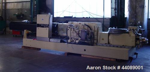 Used Coperion ZSK 70 Mc Twin Screw Extruder.  2.76" (70 mm) screws, screw speed 400 rpm.  Driven by a 153 hp/115 kW motor, 340/460/3/50, with a Flender gearbox.  Water cooled with (1) side opening.  ...