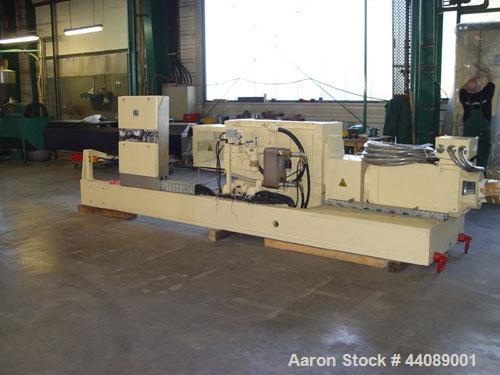 Used Coperion ZSK 70 Mc Twin Screw Extruder.  2.76" (70 mm) screws, screw speed 400 rpm.  Driven by a 153 hp/115 kW motor, 340/460/3/50, with a Flender gearbox.  Water cooled with (1) side opening.  ...