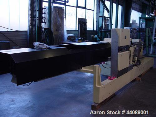 Used Coperion ZSK 70 Mc Twin Screw Extruder.  2.76" (70 mm) screws, screw speed 400 rpm.  Driven by a 153 hp/115 kW motor, 340/460/3/50, with a Flender gearbox.  Water cooled with (1) side opening.  ...