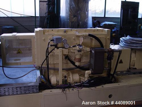 Used Coperion ZSK 70 Mc Twin Screw Extruder.  2.76" (70 mm) screws, screw speed 400 rpm.  Driven by a 153 hp/115 kW motor, 340/460/3/50, with a Flender gearbox.  Water cooled with (1) side opening.  ...