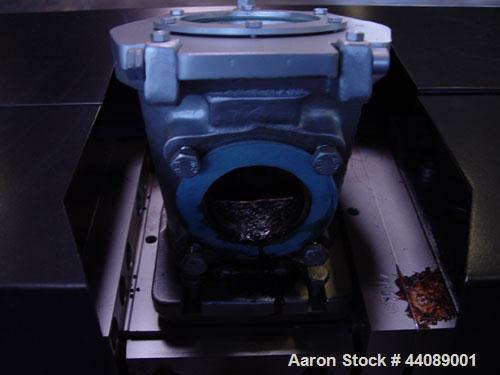 Used Coperion ZSK 70 Mc Twin Screw Extruder.  2.76" (70 mm) screws, screw speed 400 rpm.  Driven by a 153 hp/115 kW motor, 340/460/3/50, with a Flender gearbox.  Water cooled with (1) side opening.  ...