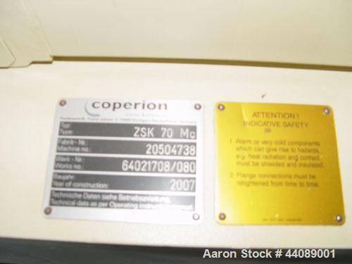 Used Coperion ZSK 70 Mc Twin Screw Extruder.  2.76" (70 mm) screws, screw speed 400 rpm.  Driven by a 153 hp/115 kW motor, 340/460/3/50, with a Flender gearbox.  Water cooled with (1) side opening.  ...