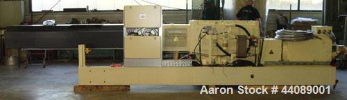 Used Coperion ZSK 70 Mc Twin Screw Extruder.  2.76" (70 mm) screws, screw speed 400 rpm.  Driven by a 153 hp/115 kW motor, 340/460/3/50, with a Flender gearbox.  Water cooled with (1) side opening.  ...