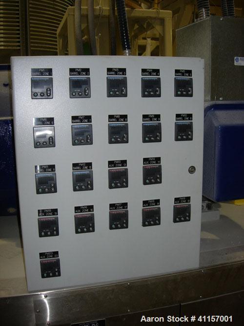 Used ENTEK MODEL EMAX 73MM EXTRUDER HAVING (2) CO-ROTATING INTERMESHING SCREWS. EXTRUDER BARREL CONSISTS OF TWELVE SECTIONS AND IS ELECTRICALLY HEATED AND WATER COOLED (CLOSED LOOP). GEAR BOX IS A HE...