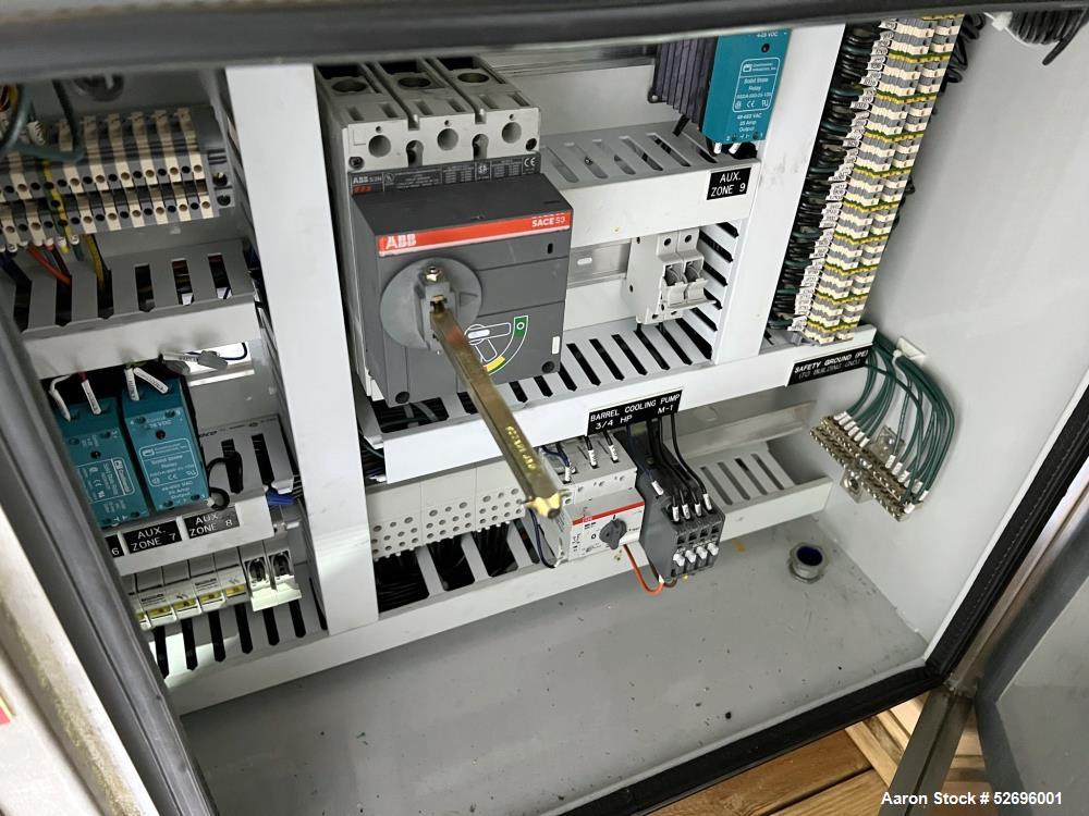 Used Entek 27mm Co-Rotating Twin Screw Extruder, Model E27MM, 48L/D, 44 to 1 L/D ratio, 45 kg/h throughput, parallel screw configuration, (11) Barrel sections electrically heated, water cooled.  Driv...