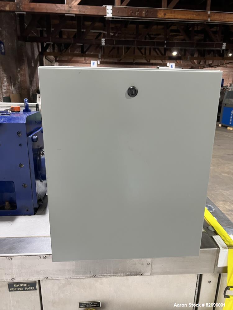 Used Entek 27mm Co-Rotating Twin Screw Extruder, Model E27MM, 48L/D, 44 to 1 L/D ratio, 45 kg/h throughput, parallel screw configuration, (11) Barrel sections electrically heated, water cooled.  Driv...