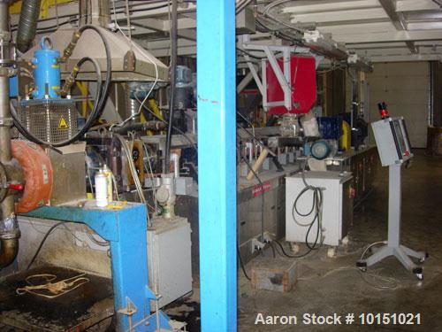 Used Entek Model EX73 Co-Rotating Twin Screw Extruder. Manufactured 2006. 73 mm screw diameter co-rotating intermeshing screws, 48:1 L/D ratio. Gearbox has a ratio of 4.09:1 and is driven by a 300 hp...