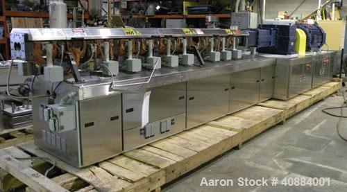 Used Entek 73 mm Co-Rotating Twin Screw Extruder, Model E-MAX 73MM 48L/D, 48 to 1 L/D ratio. (11) Barrel sections electrically heated, water cooled with system including pump, heat exchanger, and hol...