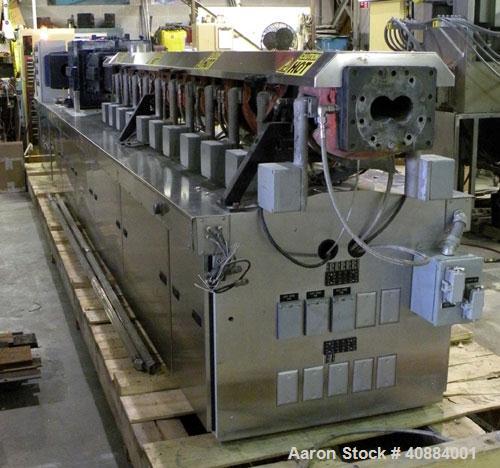 Used Entek 73 mm Co-Rotating Twin Screw Extruder, Model E-MAX 73MM 48L/D, 48 to 1 L/D ratio. (11) Barrel sections electrically heated, water cooled with system including pump, heat exchanger, and hol...