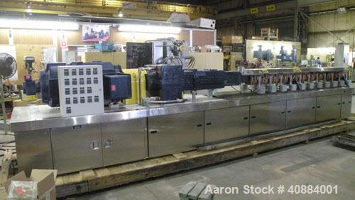 Used Entek 73 mm Co-Rotating Twin Screw Extruder, Model E-MAX 73MM 48L/D, 48 to 1 L/D ratio. (11) Barrel sections electrically heated, water cooled with system including pump, heat exchanger, and hol...