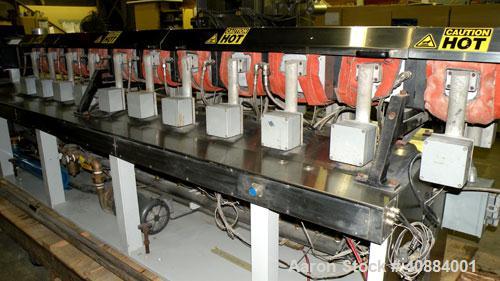 Used Entek 73 mm Co-Rotating Twin Screw Extruder, Model E-MAX 73MM 48L/D, 48 to 1 L/D ratio. (11) Barrel sections electrically heated, water cooled with system including pump, heat exchanger, and hol...