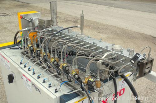Used Farrel 26 MM Laboratory Twin Screw Extruder, Model FTX20. Co-Rotating inter-meshing side by side screw design, approximately 41’’ long. Nickel-Iron alloy clam shell design barrel, water cooled. ...