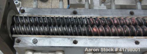 Used Farrel 26 MM Laboratory Twin Screw Extruder, Model FTX20. Co-Rotating inter-meshing side by side screw design, approximately 41’’ long. Nickel-Iron alloy clam shell design barrel, water cooled. ...