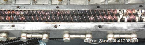 Used Farrel 26 MM Laboratory Twin Screw Extruder, Model FTX20. Co-Rotating inter-meshing side by side screw design, approximately 41’’ long. Nickel-Iron alloy clam shell design barrel, water cooled. ...