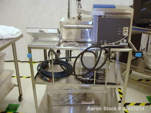 Used Haake Twin Screw Extruder, Model MINILAB. Co-rotating conical screws, electrically heated, water cooled barrel, with Thermo Fischer force feeder with minilab controller, serial #1200502065001.