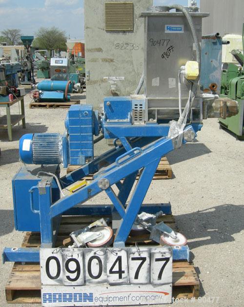 USED: K-tron twin screw side feeder, 80 mm, type K-T80-SF. Includes hopper. Driven by a 4kw (5.3 hp), 3/50/380/480 volt, 1440/1740 rpm geaarmotor, ratio 11.18 to 1. mounted on a carbon steel frame wi...