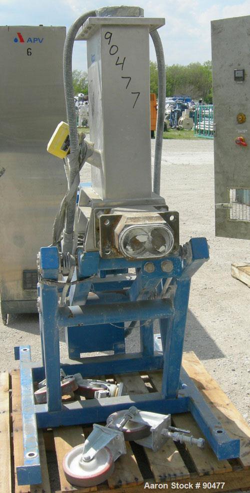 USED: K-tron twin screw side feeder, 80 mm, type K-T80-SF. Includes hopper. Driven by a 4kw (5.3 hp), 3/50/380/480 volt, 1440/1740 rpm geaarmotor, ratio 11.18 to 1. mounted on a carbon steel frame wi...